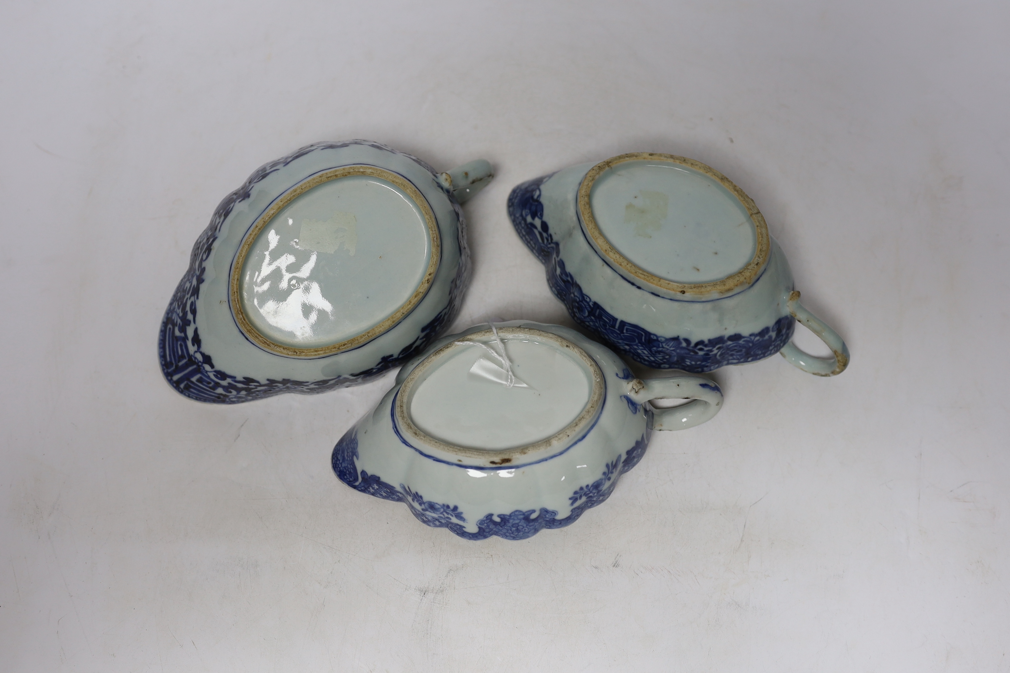 Three Chinese blue and white sauceboats, Qianlong period, widest 19cm